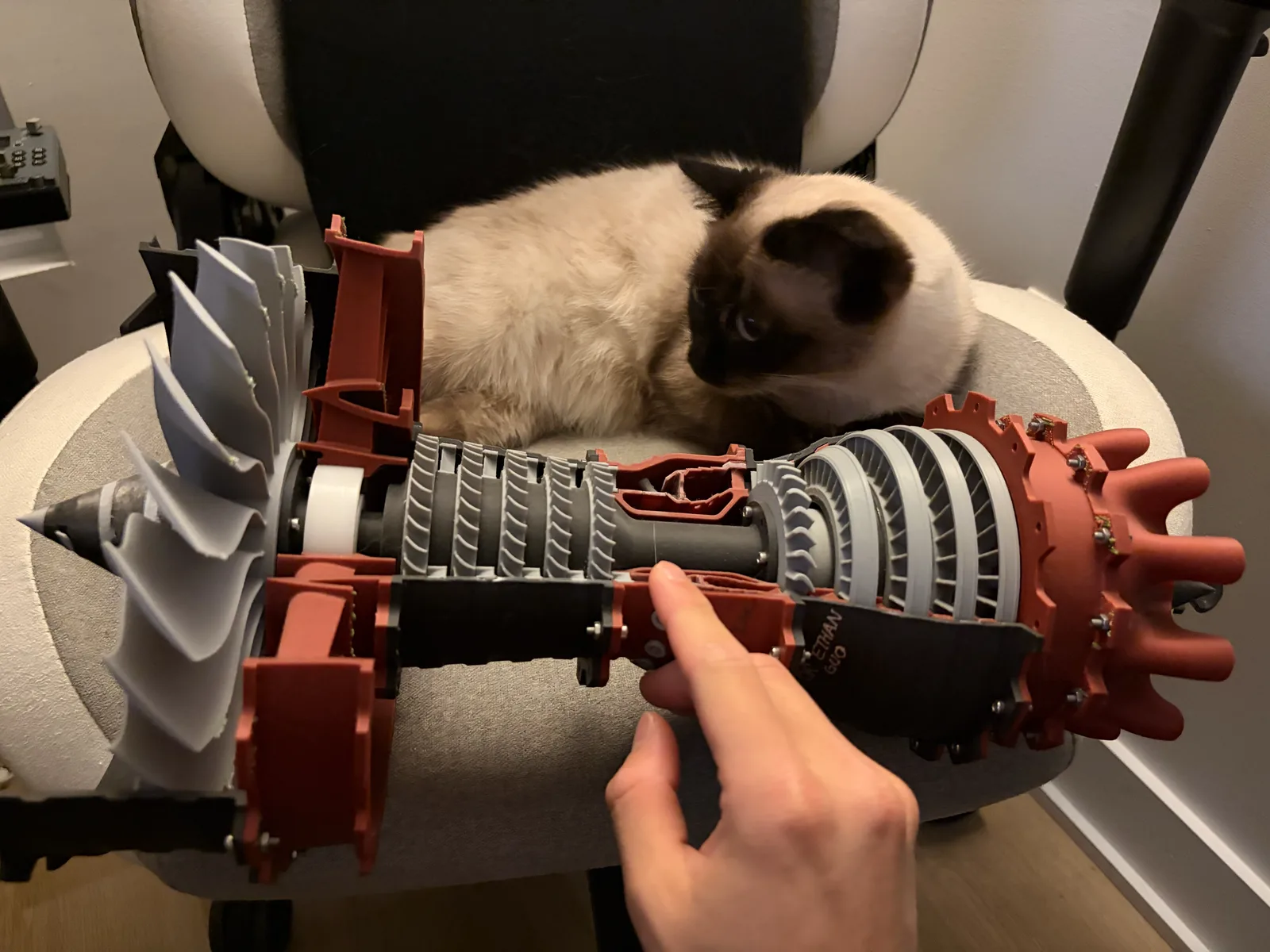 3D-printed cutaway model of the BOSTON combined-cycle engine — fan, compressor stages, and turbine